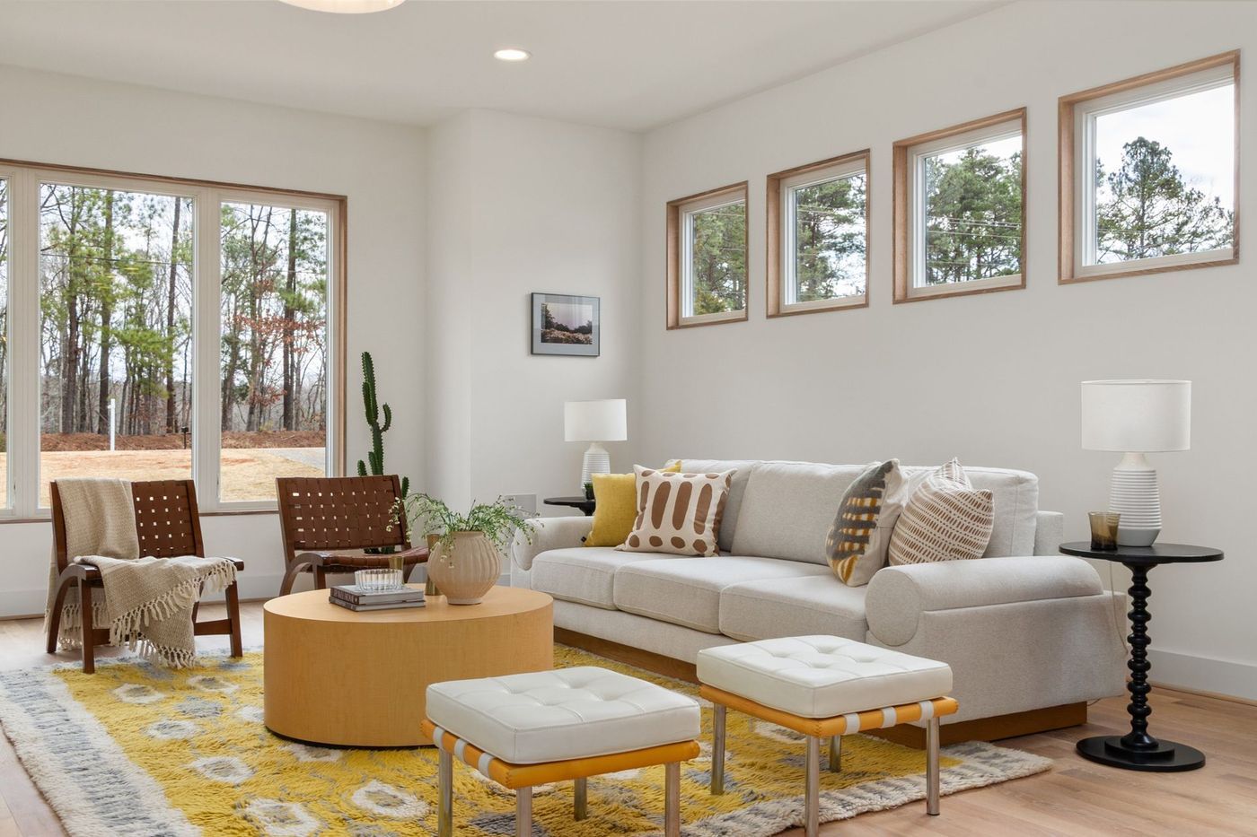 An airy, minimalist living room in natural light
